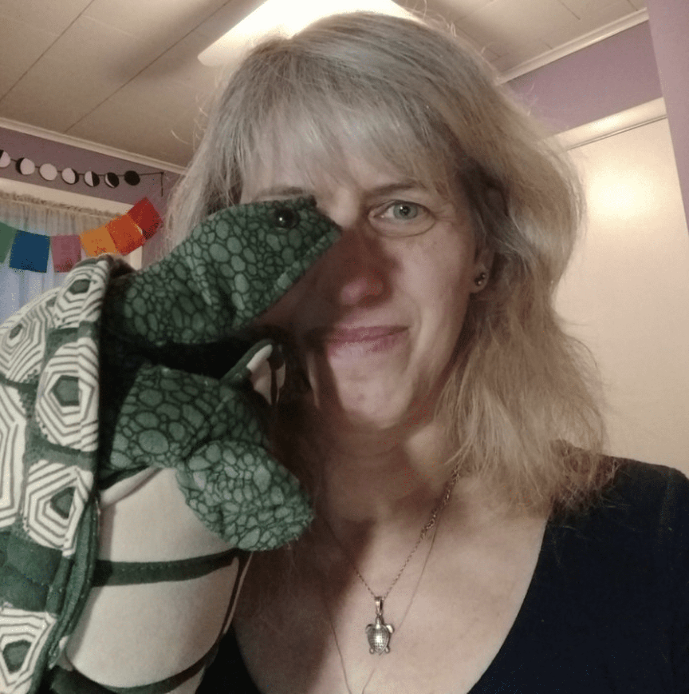 Debbie with turtle puppet